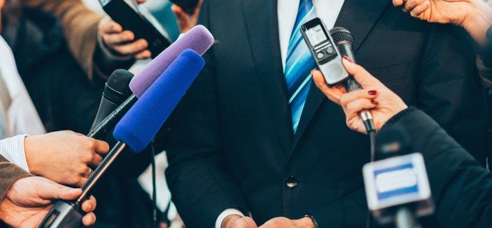 Public relations specialist giving interview