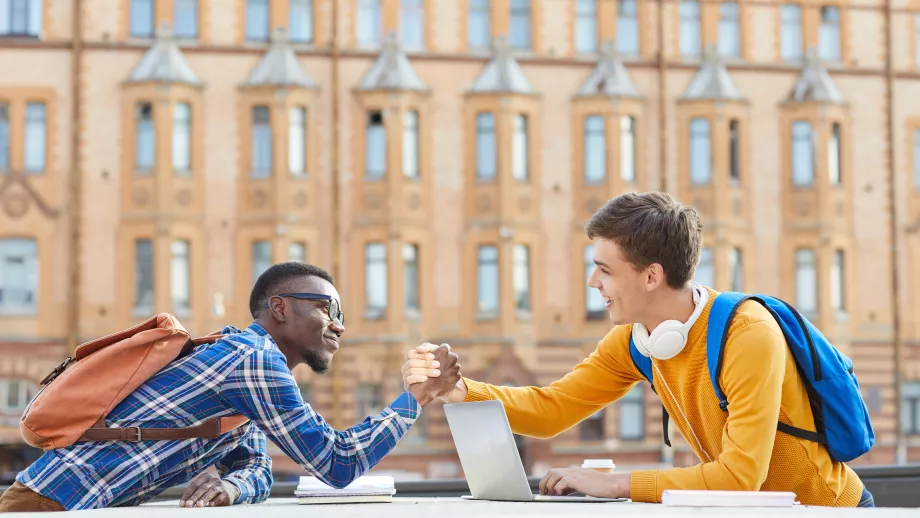 International students greeting each other