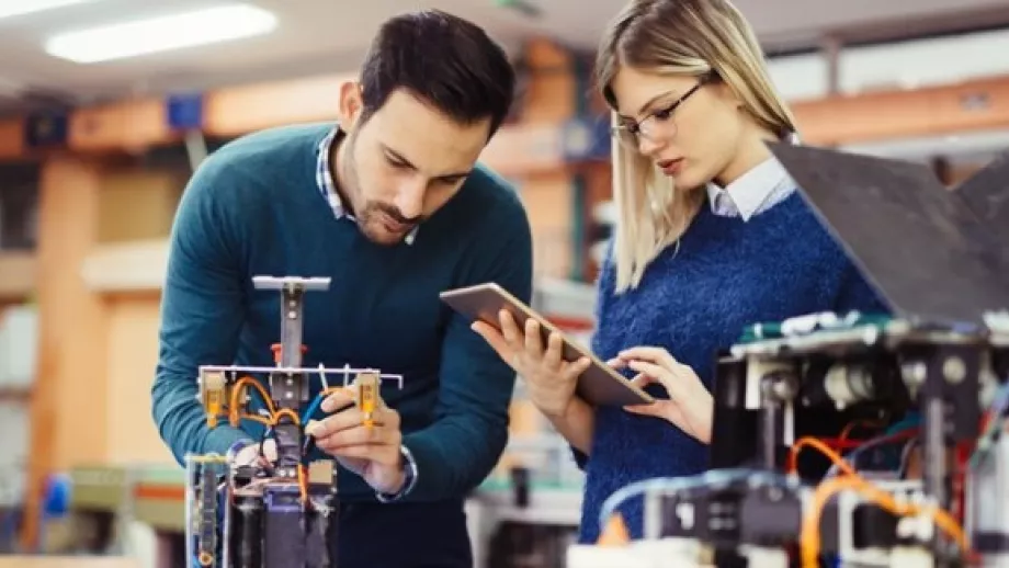 Two engineers working on a project