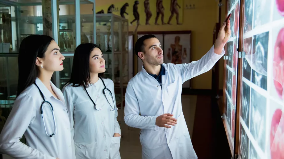 Medical students look at an X-ray
