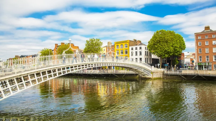 Hapenny Bridge and Liffey River in Dublin